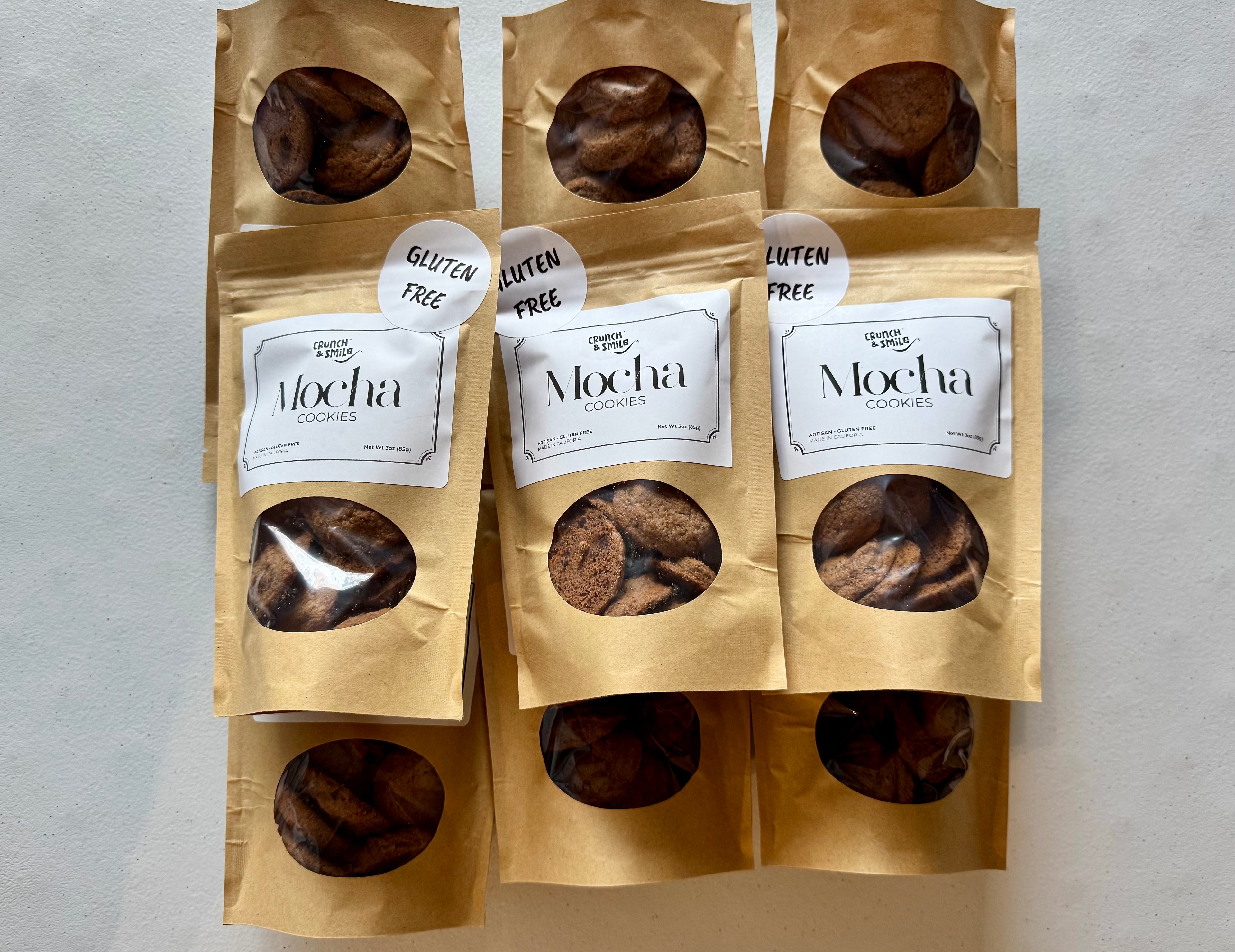 Mocha gluten-free cookies in kraft paper bags, assorted chocolate cookie varieties